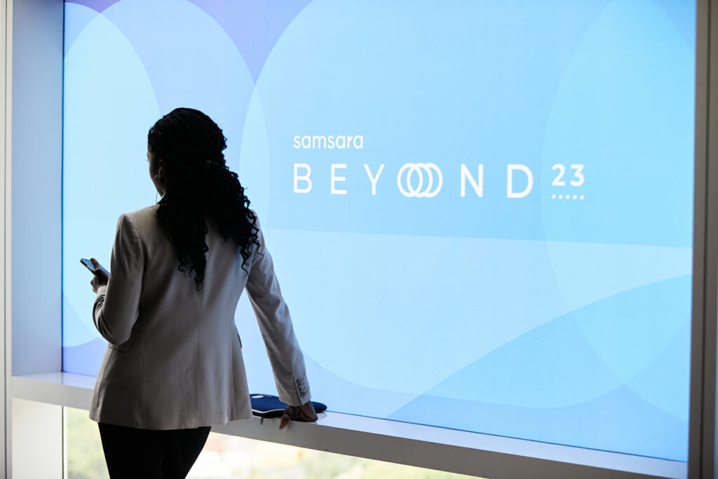 person in front of screen