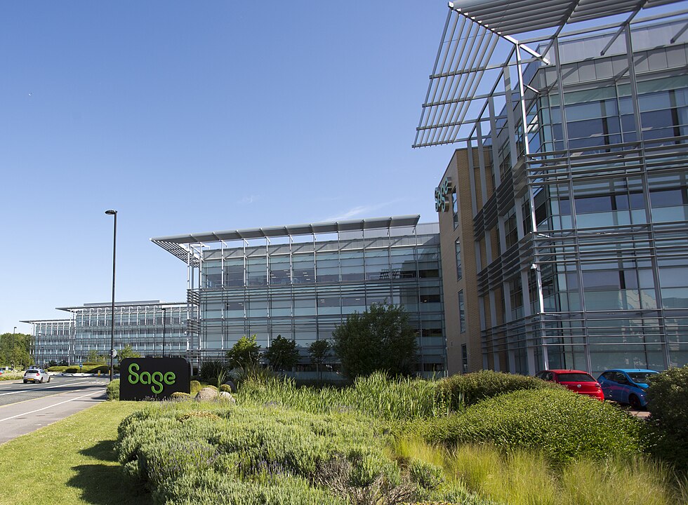 a big office building with a green sign saying 'Sage' | Sage stands out with “high pace of innovation” amid upbeat year-end results