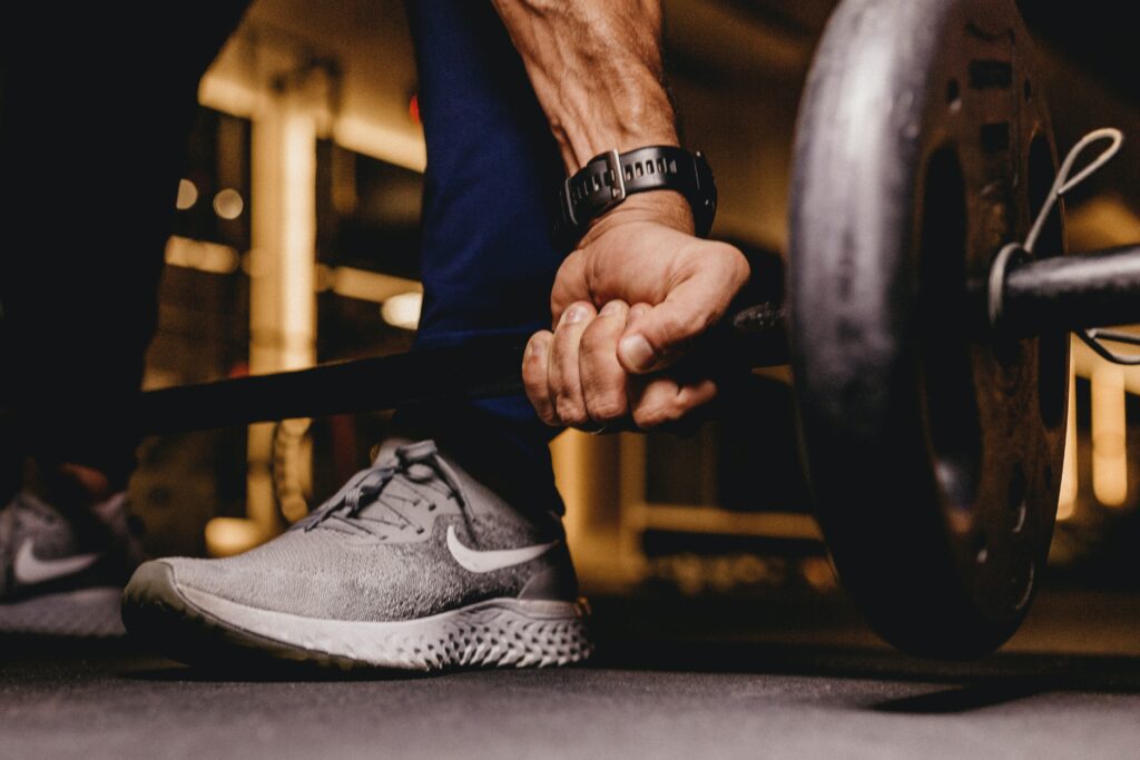a person lifting a barbell