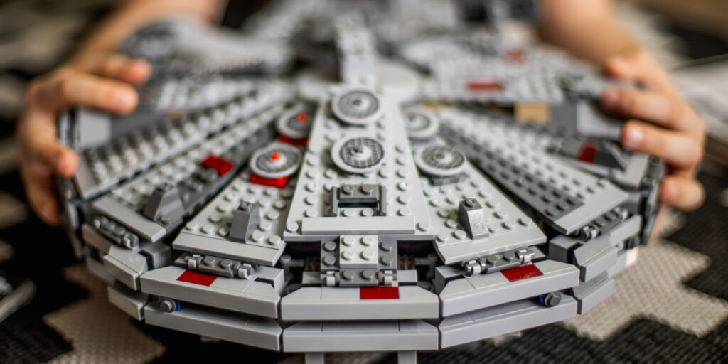 A picture of legos built into a sphere.