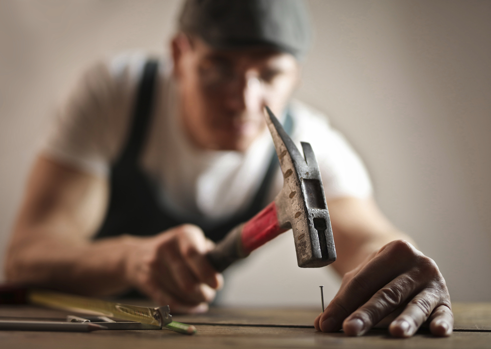 Carpenter,Hammering,A,Nail